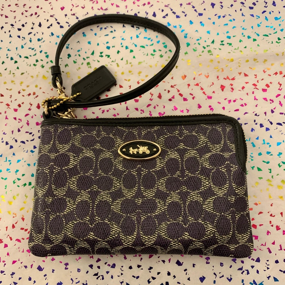 Lovely Purple Coach Wristlet with single zipper and gold accents